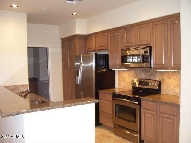 3935 East Rough Rider Road, Unit 1074 Phoenix, AZ 85050 - Photo 7 of 22 Rough Rider-Kitchen