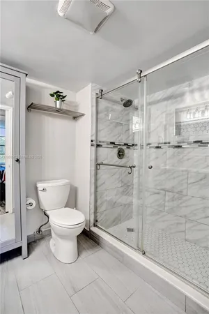 a view of a room with racks on the wall