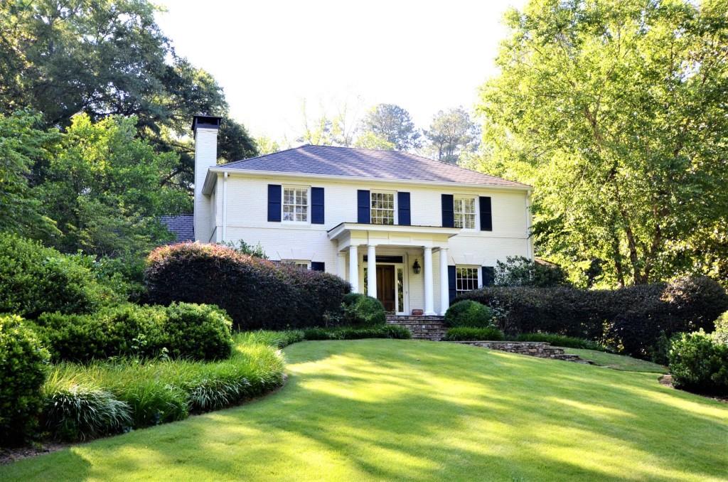 Elegant Estate nestled on almost 2 acres of picturesque land