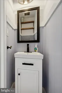 a bathroom with a sink and a vanity