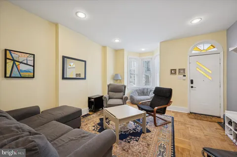 a living room with furniture and a couch