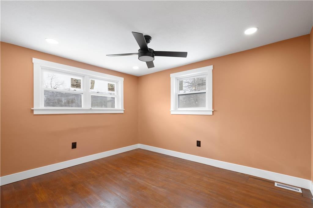 933 Boyce Road Bridgeville, PA 15017 - Photo 19 of 36 a view of empty room with wooden floor