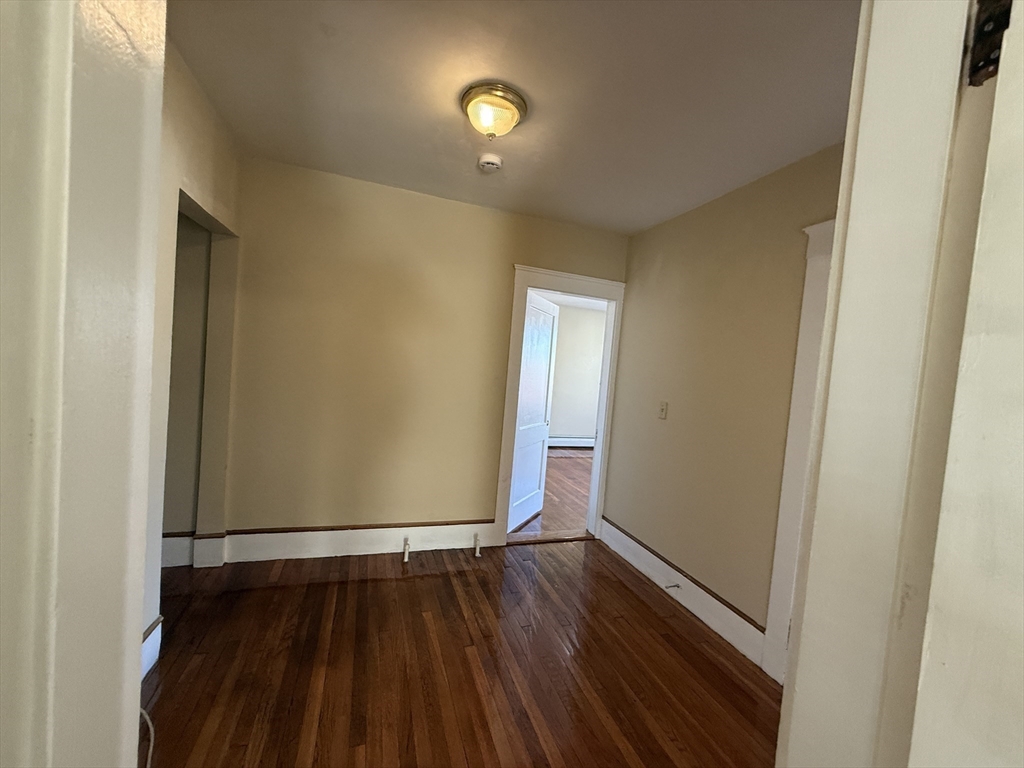 17 Wales Street, Unit 3 Boston, MA 02124 - Photo 9 of 17 a view of a room with wooden floor