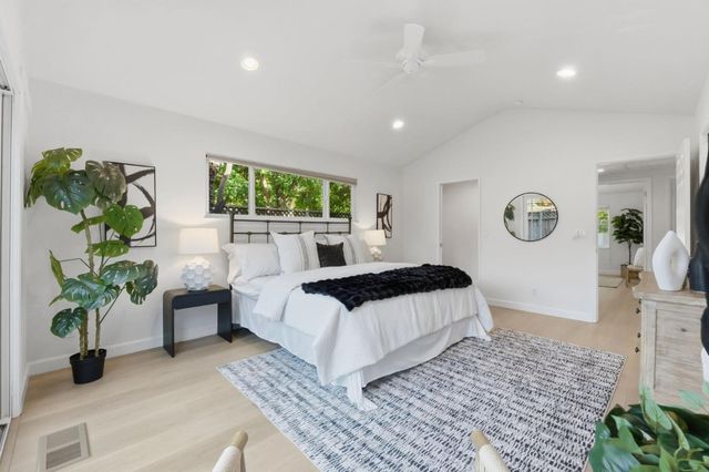 a backyard of a house with seating space