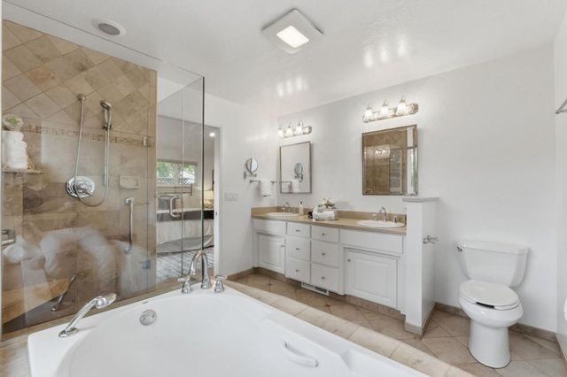 a utility room with cabinets