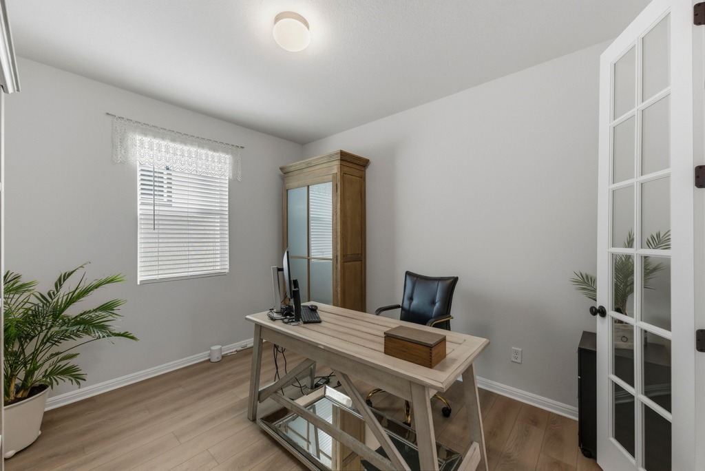 264 Denali Way Dripping Springs, TX 78620 - Photo 10 of 28 Office space with light wood-style flooring and baseboards