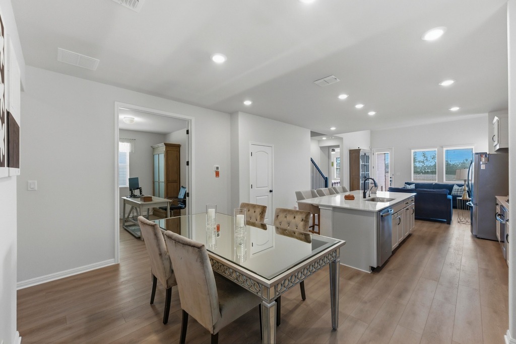 264 Denali Way Dripping Springs, TX 78620 - Photo 3 of 28 Dining area with light wood finished floors and recessed lighting