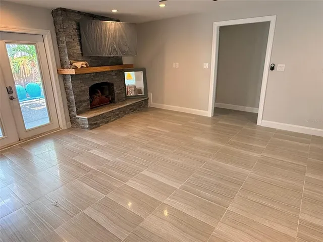 a kitchen with a sink stove and microwave
