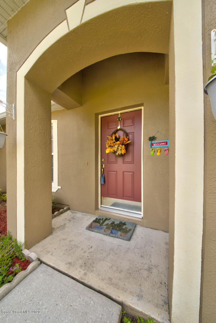 158 Tudor Road Southwest Palm Bay, FL 32908 - Photo 8 of 36 a view of front door
