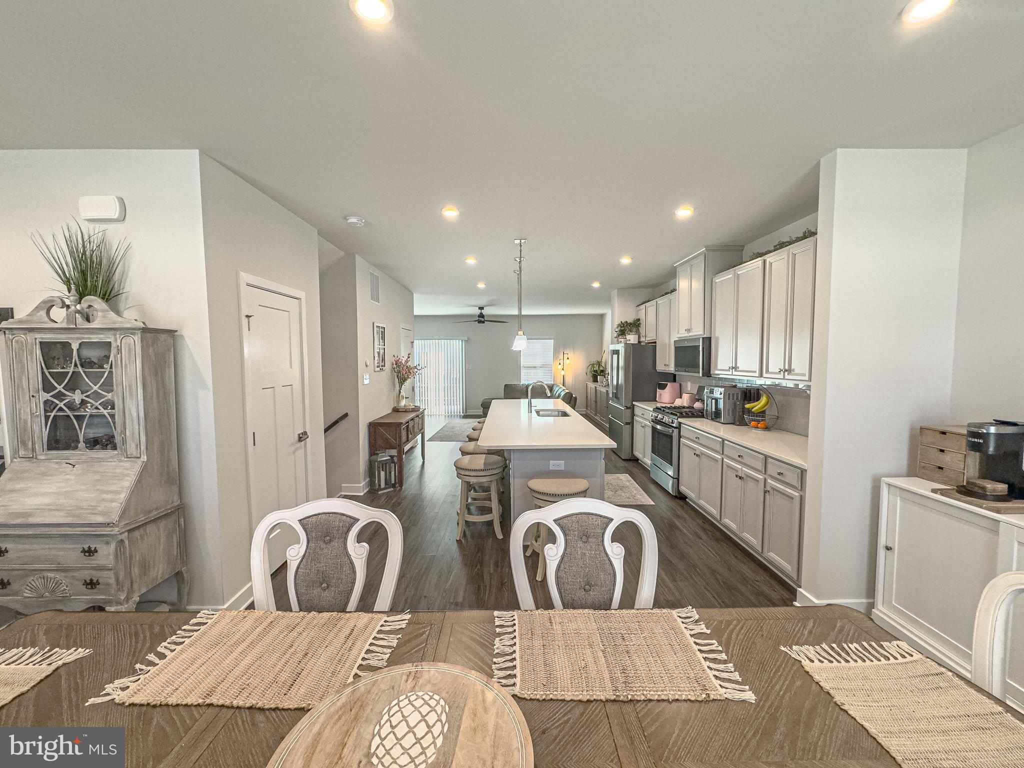 4 Flamingo Court Sewell, NJ 08080 - Photo 27 of 55 a kitchen with stainless steel appliances kitchen island granite countertop a sink and cabinets
