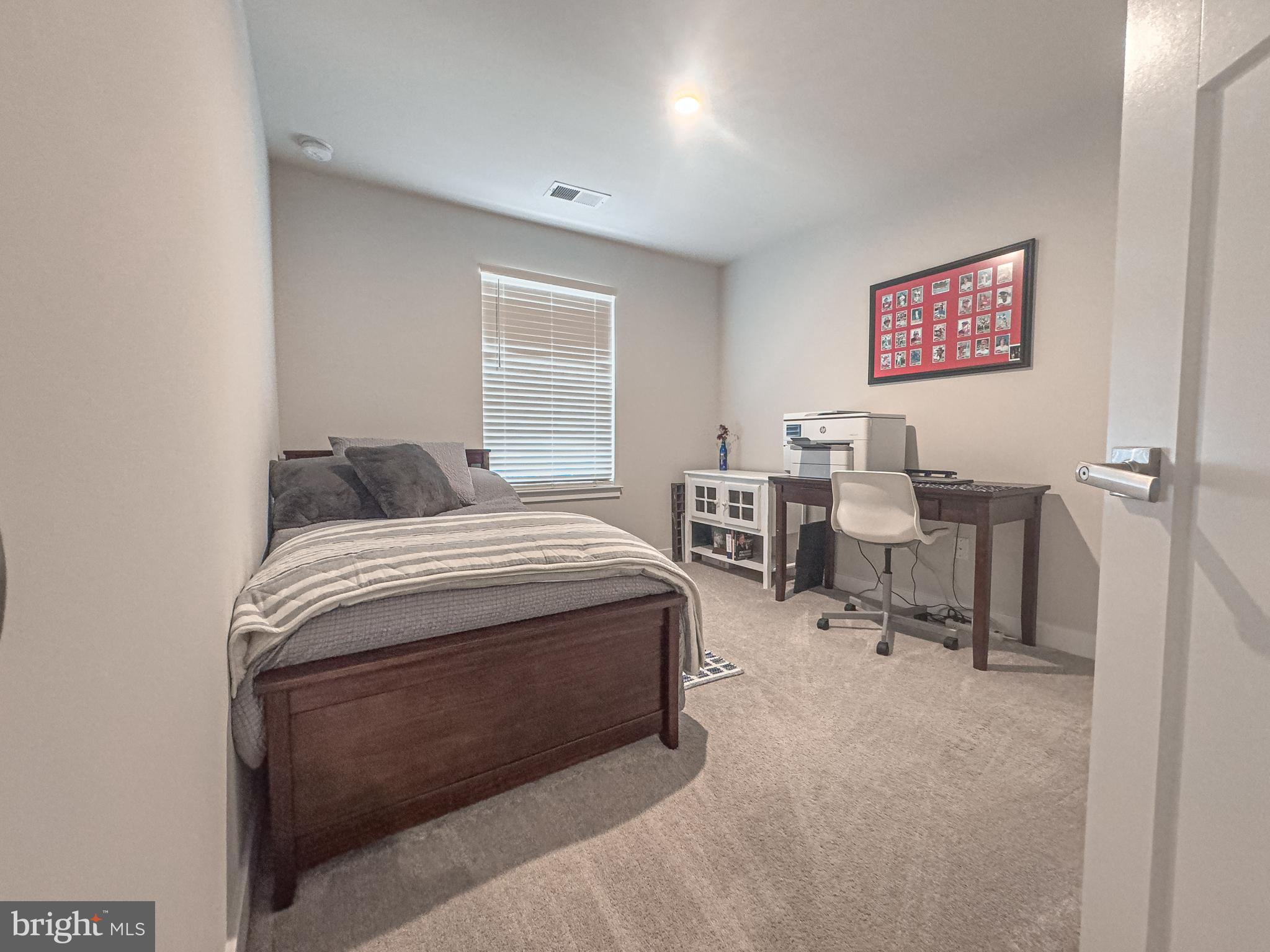 4 Flamingo Court Sewell, NJ 08080 - Photo 34 of 55 a bedroom with a bed and chair