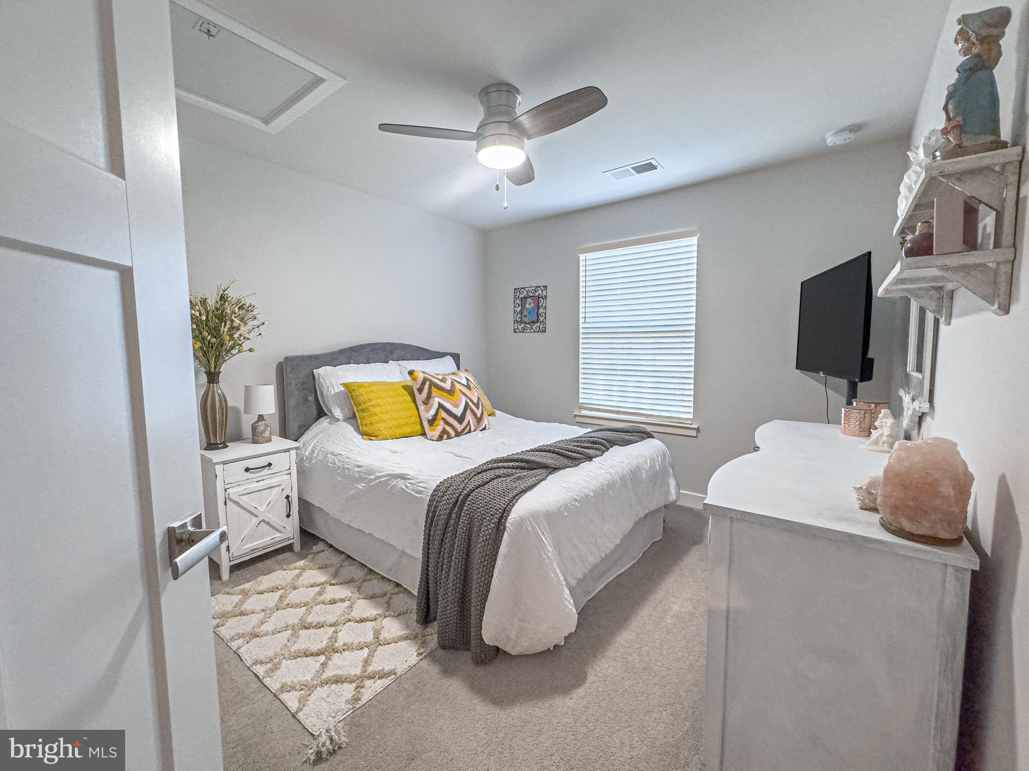 4 Flamingo Court Sewell, NJ 08080 - Photo 37 of 55 a bedroom with a bed and flat screen tv