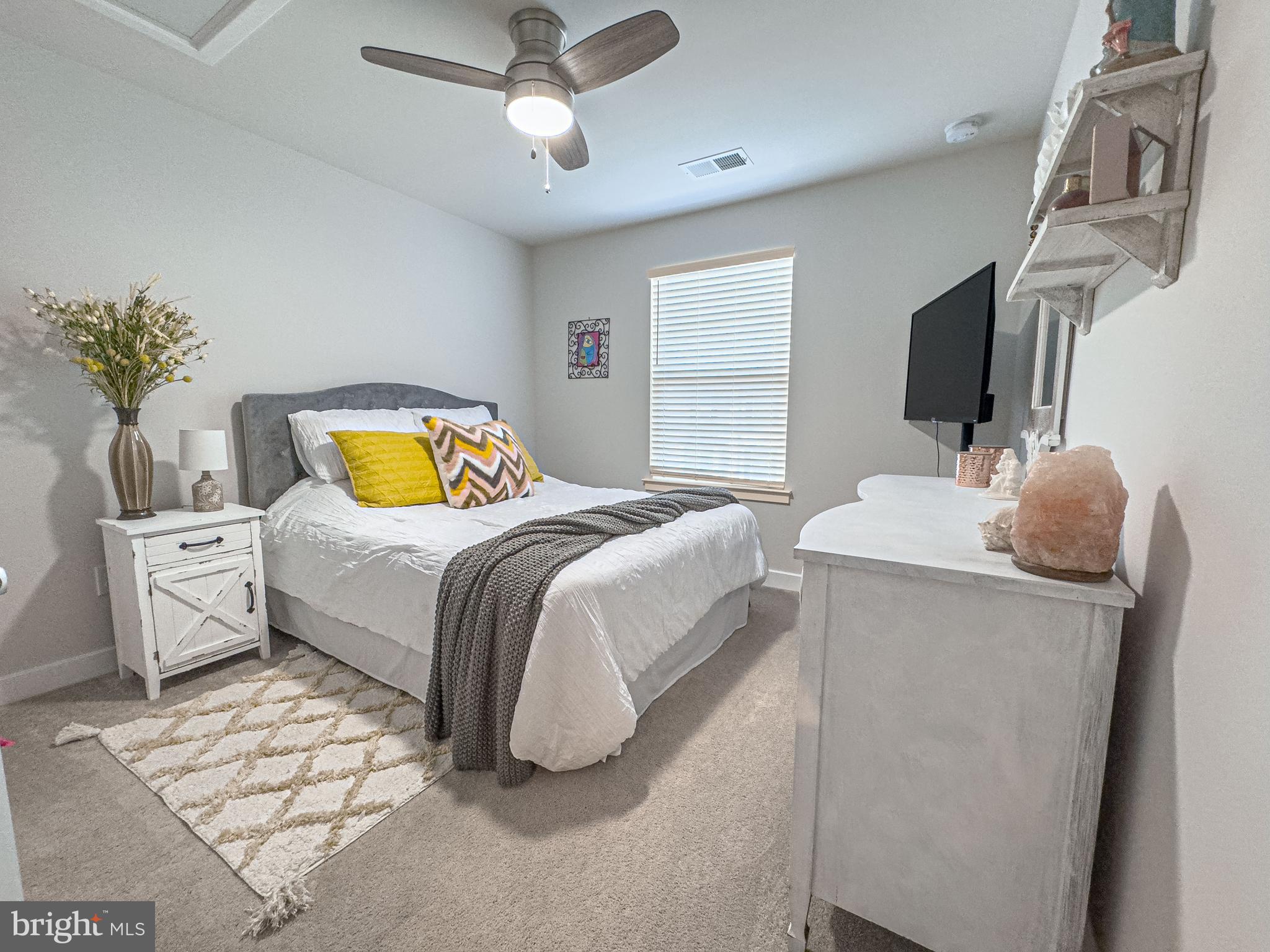 4 Flamingo Court Sewell, NJ 08080 - Photo 38 of 55 a bedroom with a bed and flat screen tv