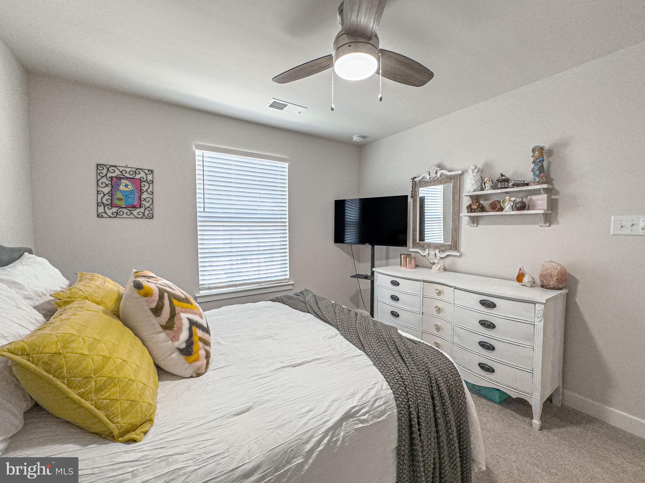 4 Flamingo Court Sewell, NJ 08080 - Photo 40 of 55 a bedroom with a bed and a flat screen tv