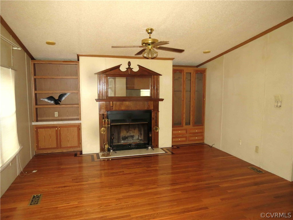 5712 Anderson Mill Road Church Road, VA 23833 - Photo 5 of 24 FAMILY ROOM, BUILT IN CABINETS, HARDWOOD FLOORS
