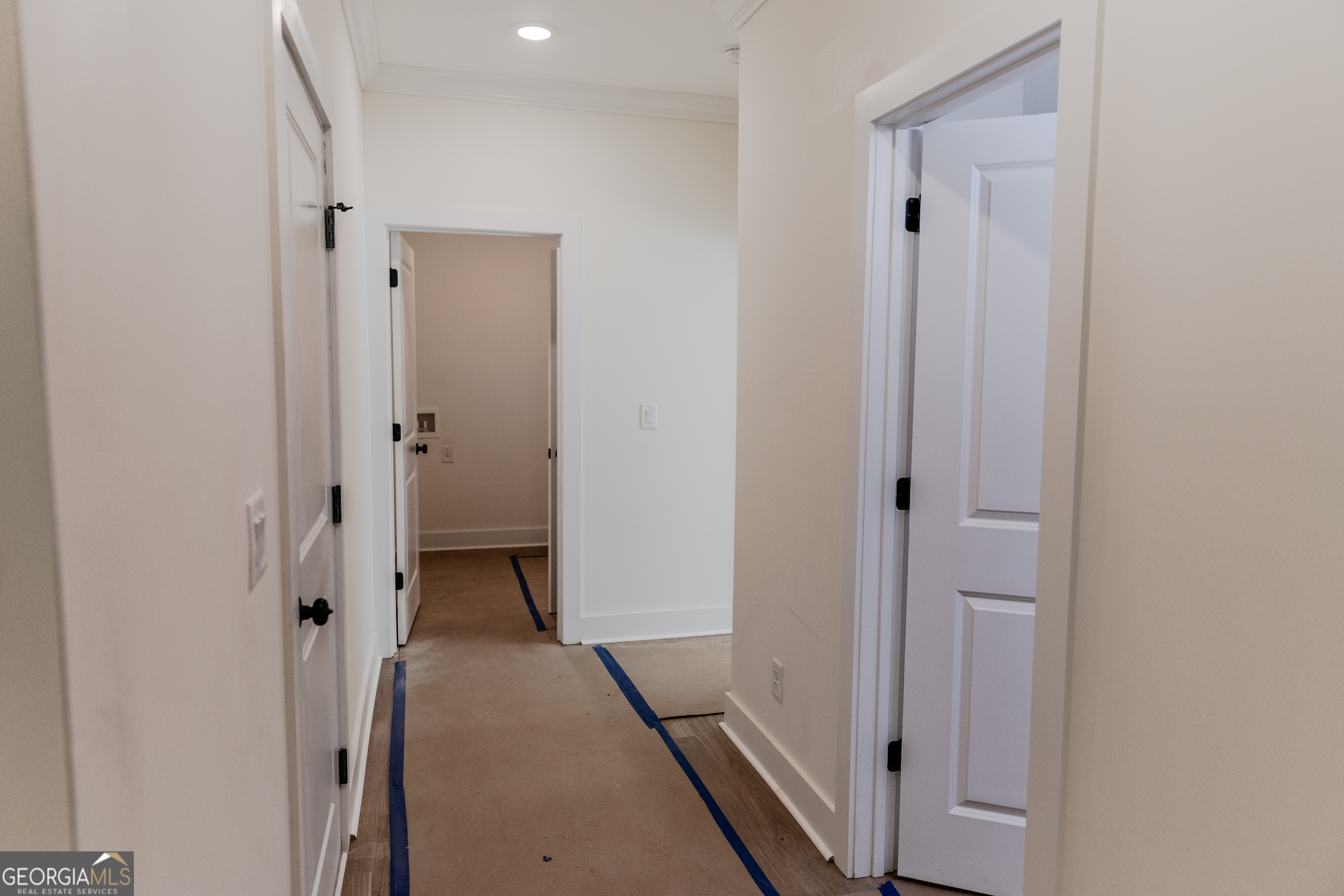 632 Campbell Road Covington, GA 30014 - Photo 14 of 60 a view of a hallway with wooden floor and closet
