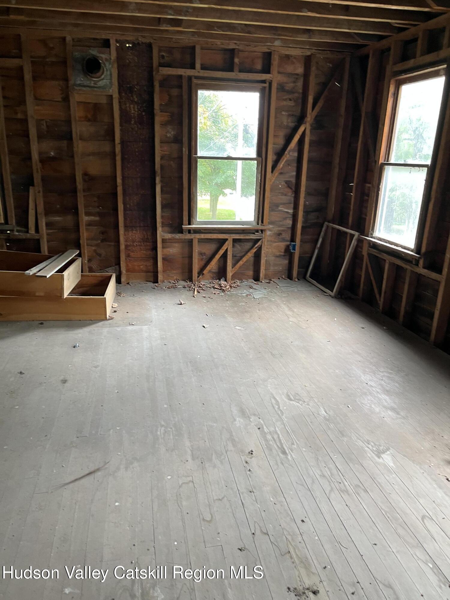 7838 Route 81 Oak Hill Oak Hill, NY 12460 - Photo 9 of 14 a view of an empty room with a window