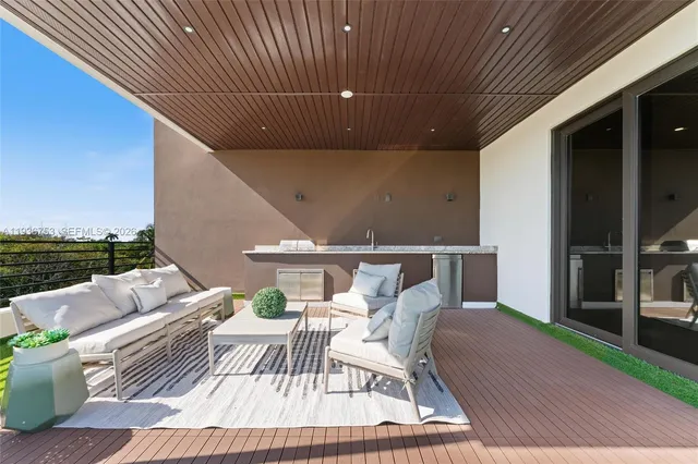 a view of balcony with furniture