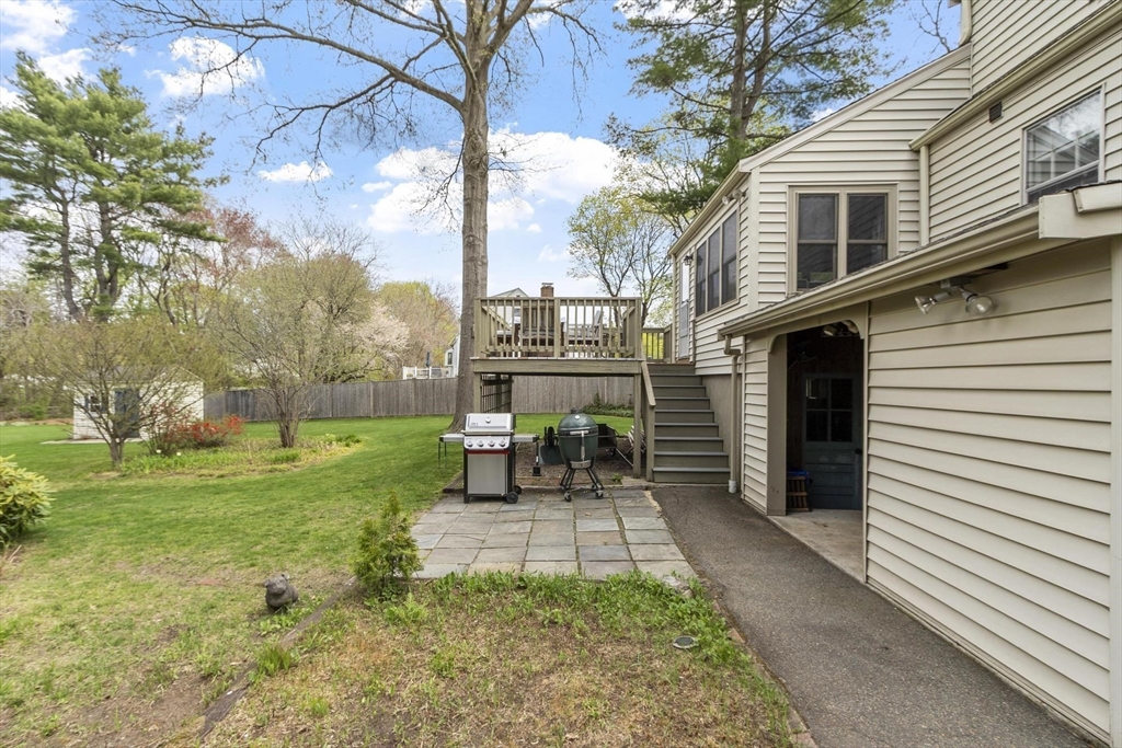 122 Southfield Road Concord, MA 01742 - Photo 20 of 28 a view of a house with backyard and a sitting area