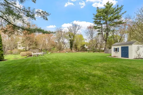 a view of a backyard with a garden