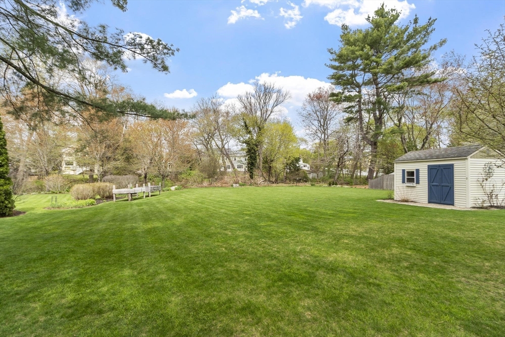 122 Southfield Road Concord, MA 01742 - Photo 21 of 28 a view of a house with a backyard