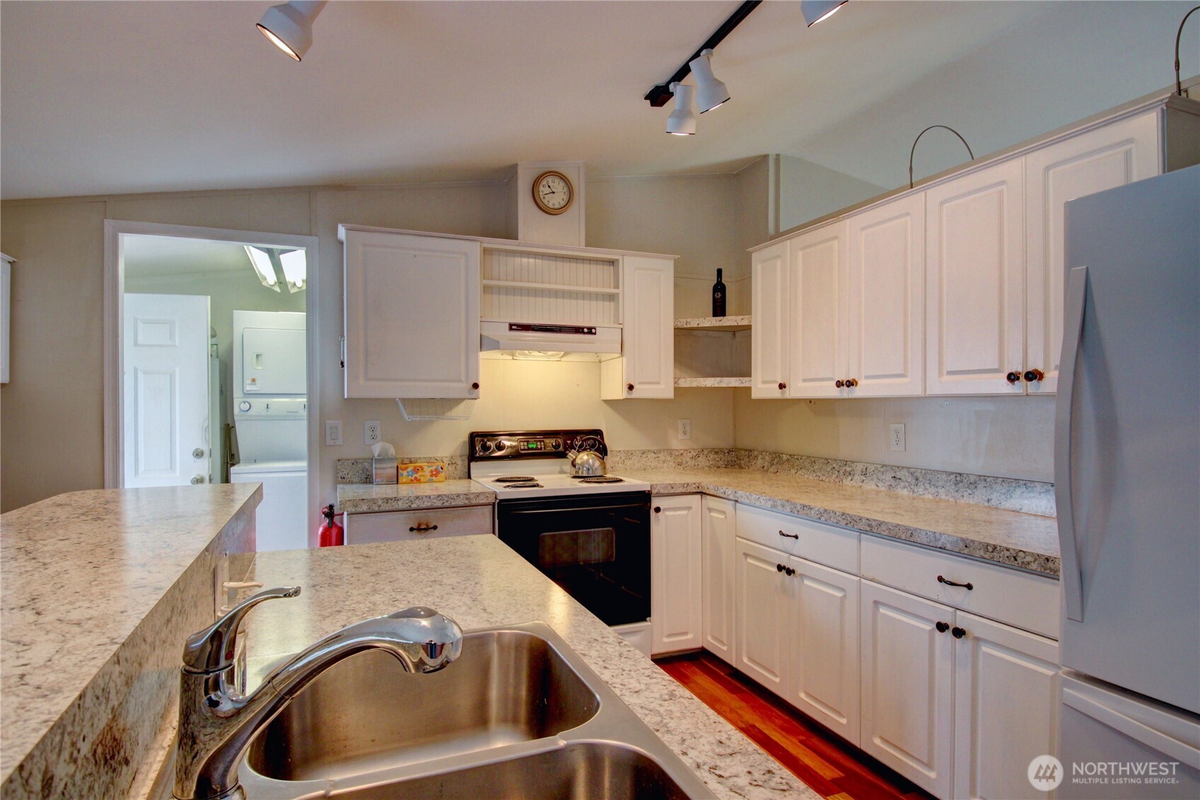 2901 Schuller Place Mount Vernon, WA 98273 - Photo 12 of 40 a kitchen that has a sink cabinets counter space and appliances