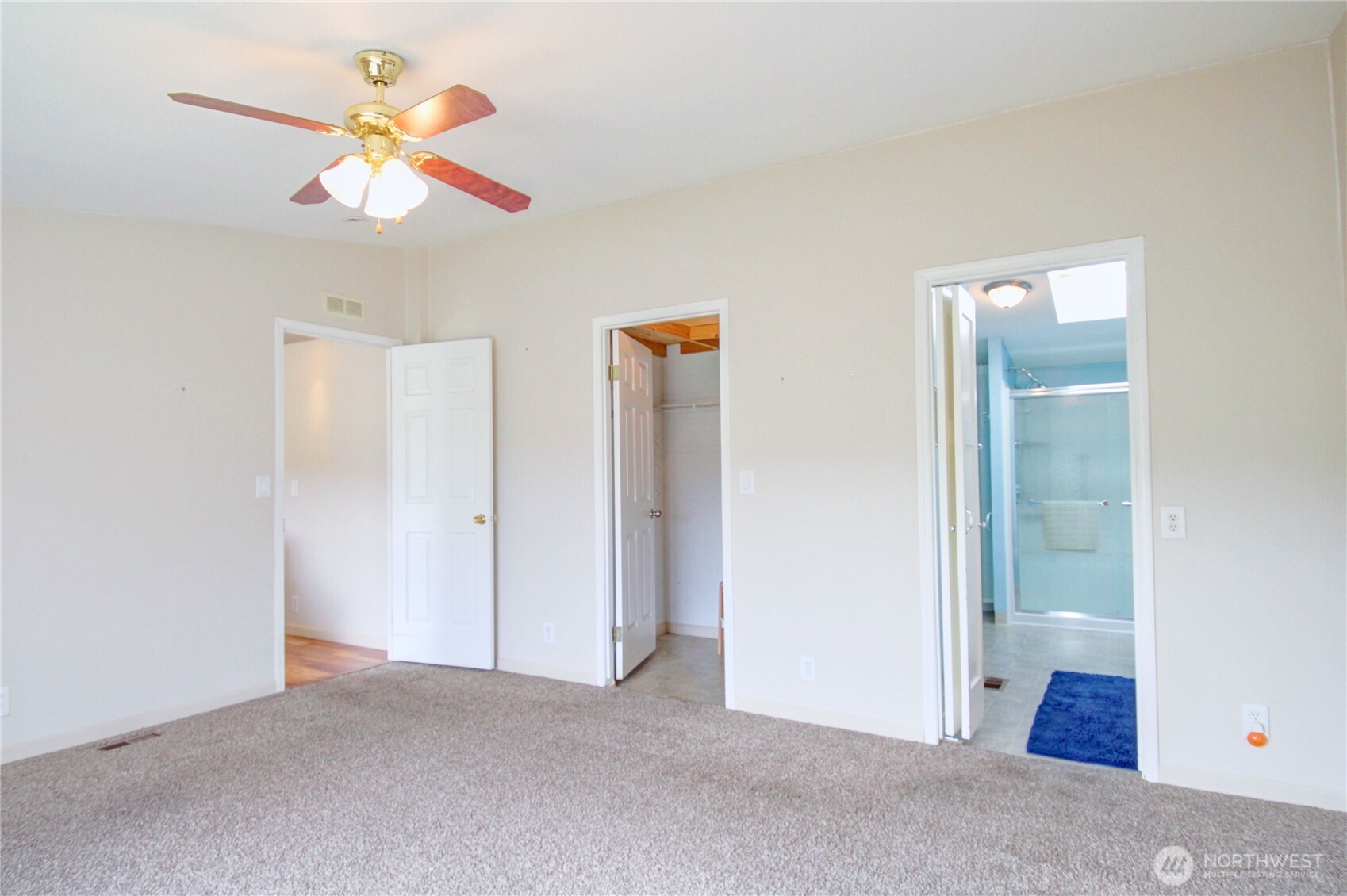 2901 Schuller Place Mount Vernon, WA 98273 - Photo 25 of 40 an empty room with closet and a ceiling fan