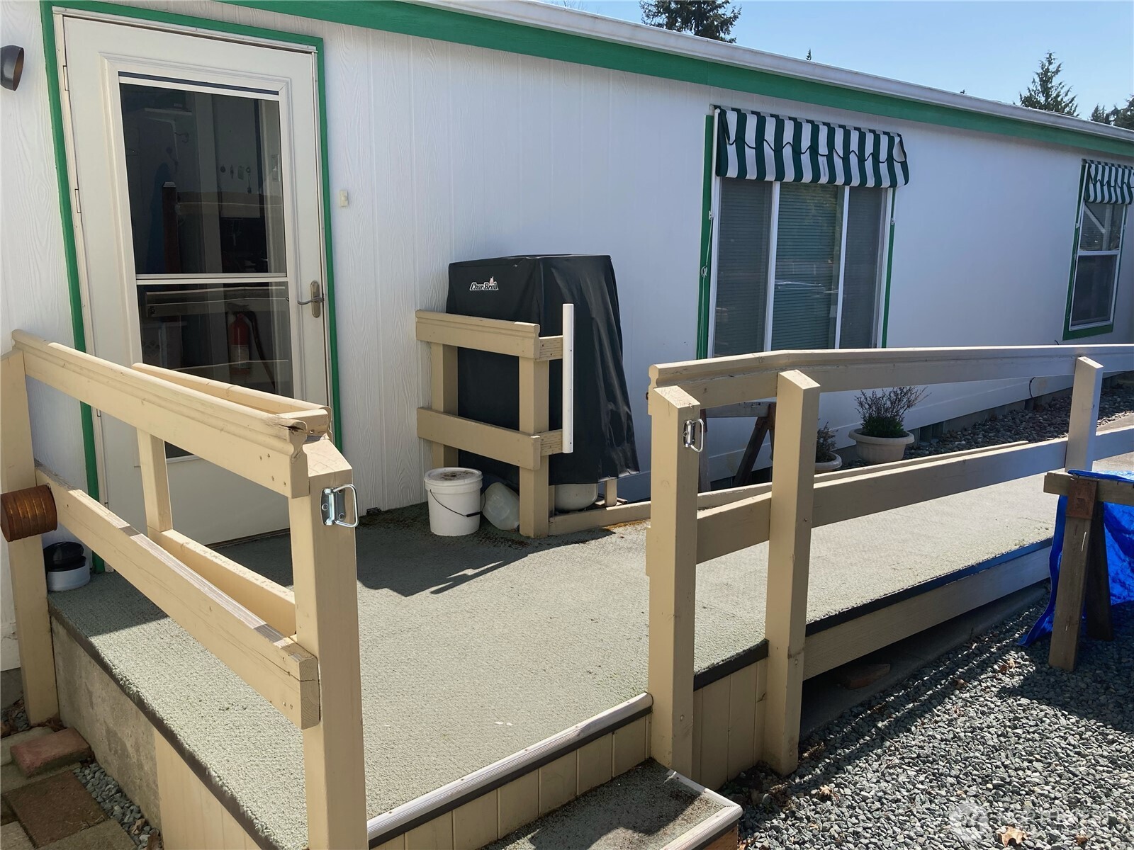 2901 Schuller Place Mount Vernon, WA 98273 - Photo 31 of 40 a kitchen with a stove and white cabinets