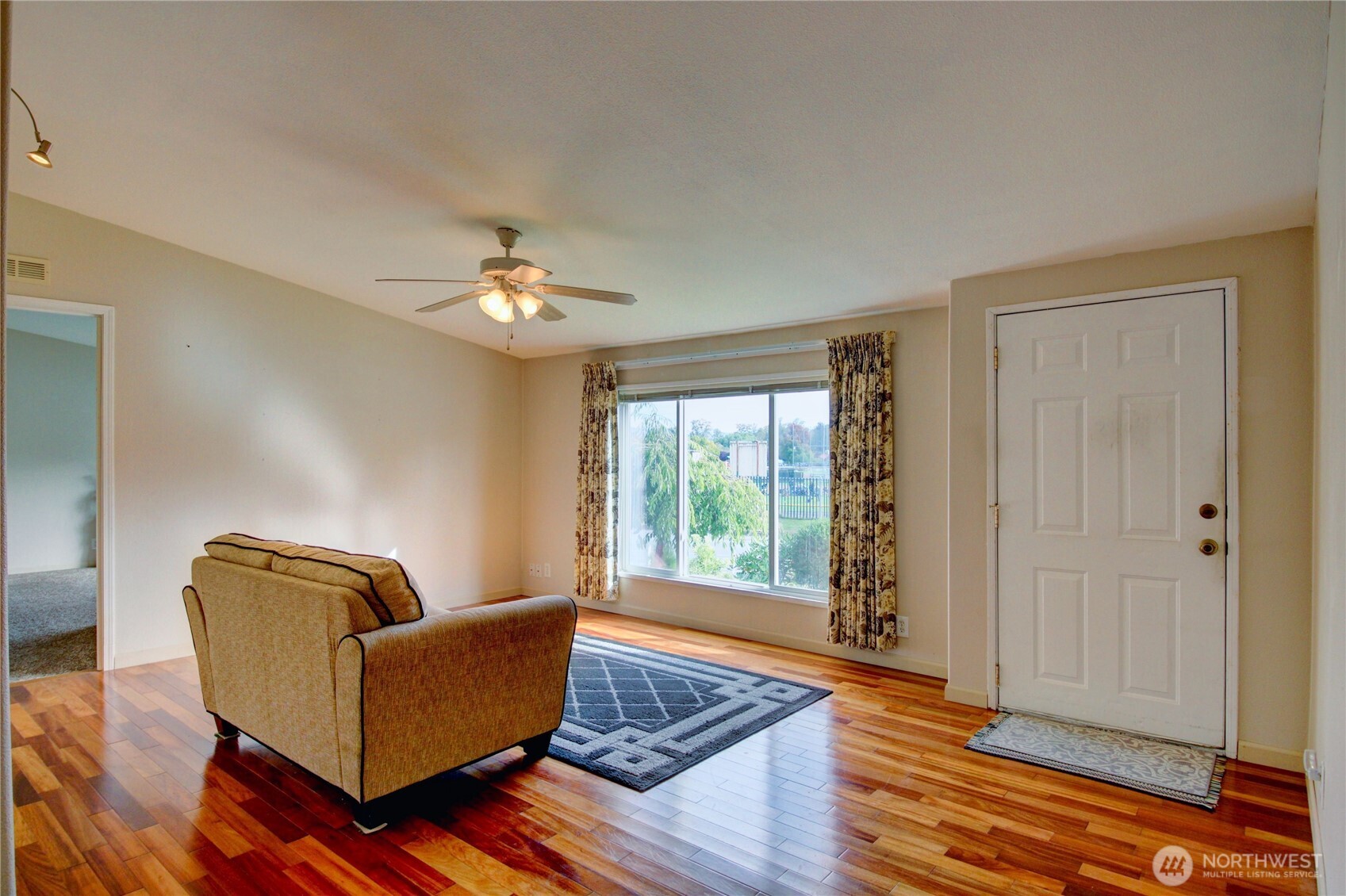 2901 Schuller Place Mount Vernon, WA 98273 - Photo 7 of 40 a living room with furniture and a window