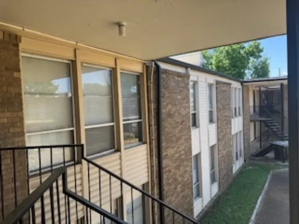 a view of balcony with patio