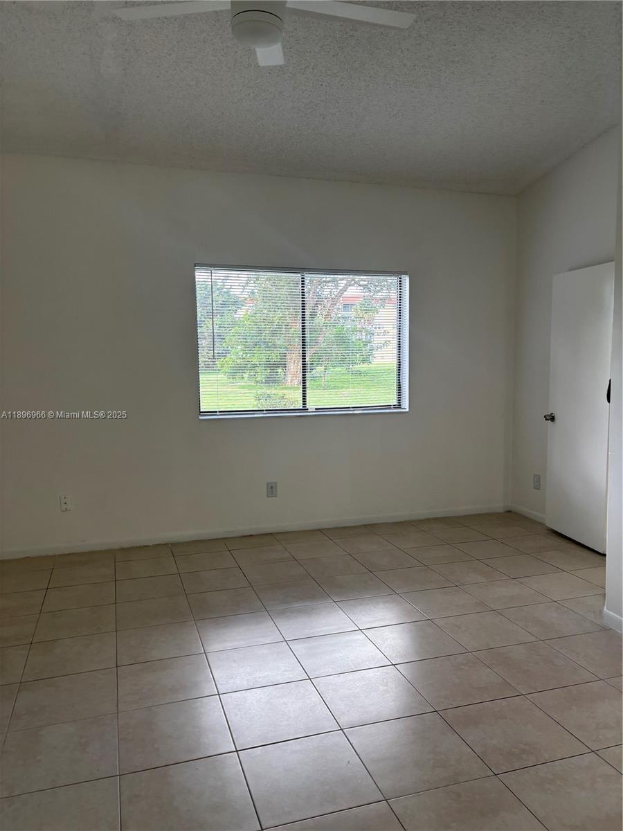 3629 Inverrary Boulevard West Lauderhill, FL 33319 - Photo 16 of 16 an empty room with windows