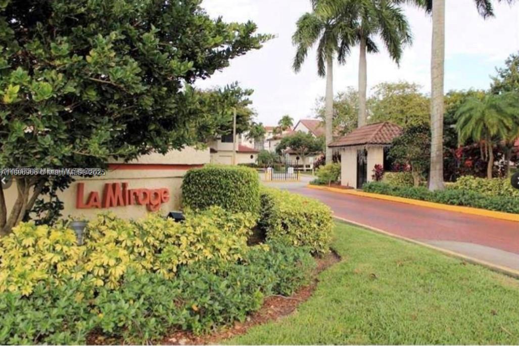3629 Inverrary Boulevard West Lauderhill, FL 33319 - Photo 2 of 16 a view of a house with a yard and potted plants