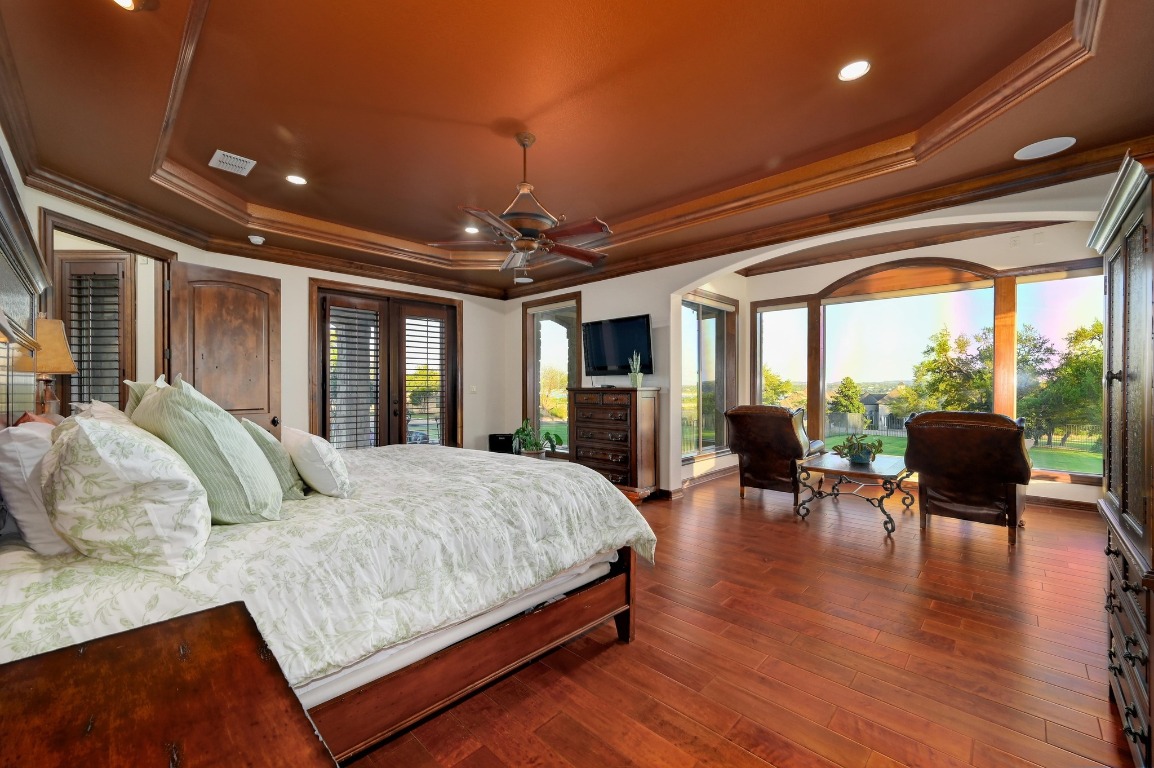 1298 Mystic Parkway Spring Branch, TX 78070 - Photo 13 of 40 a bedroom with a large bed and a large window