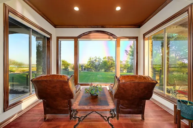a large bathroom with a large tub and sink