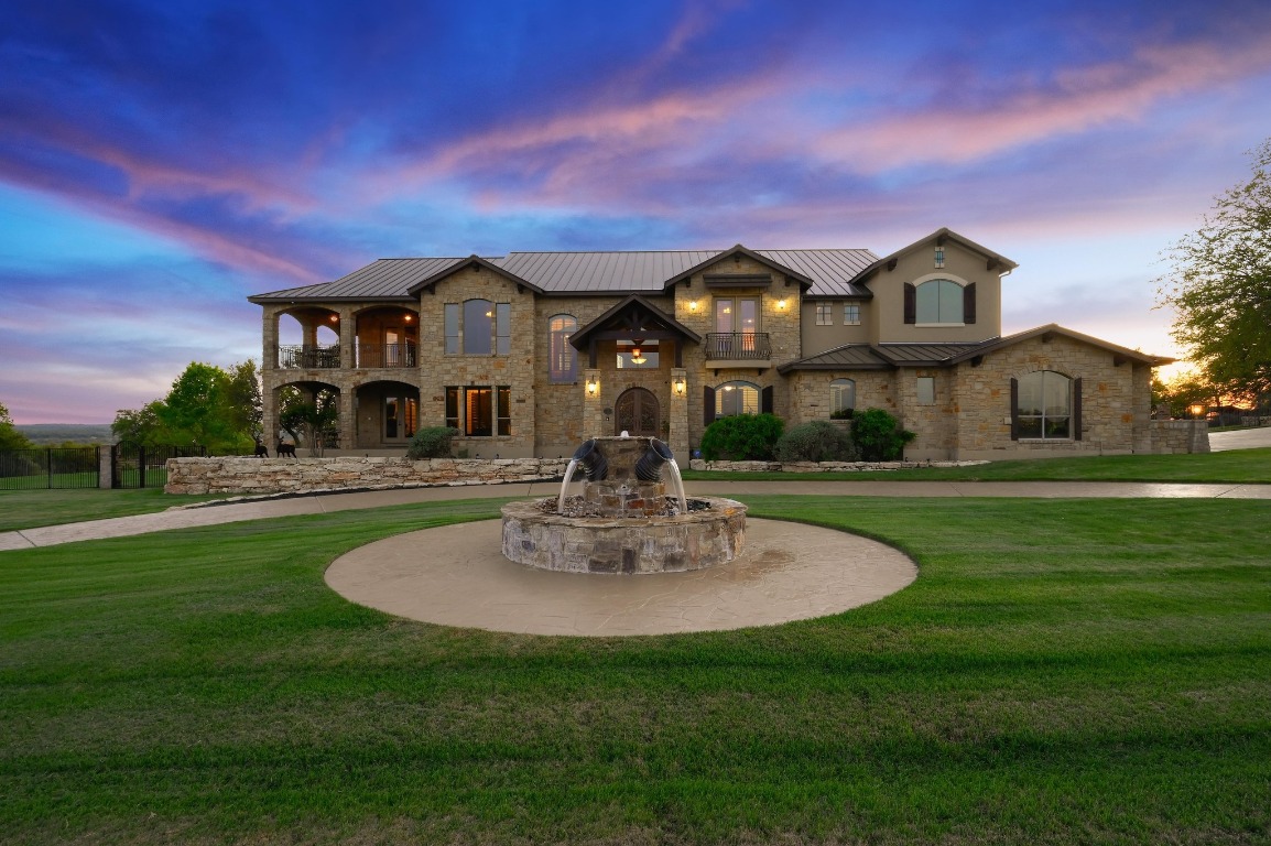 1298 Mystic Parkway Spring Branch, TX 78070 - Photo 2 of 40 a front view of a house with a garden