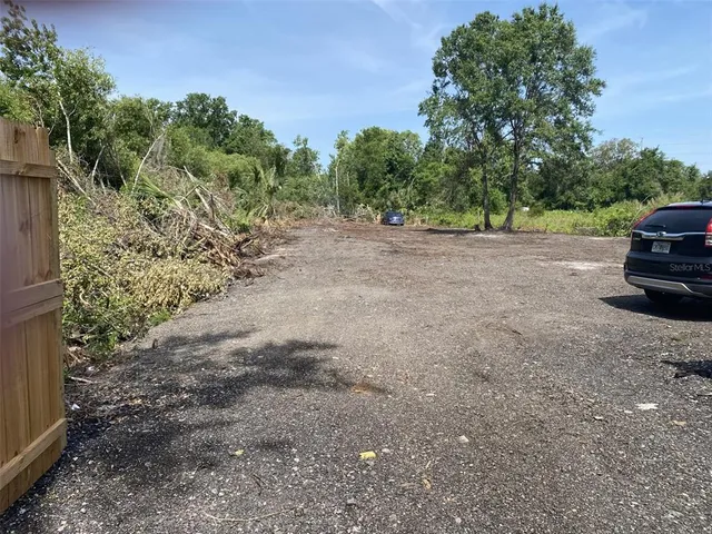 a view of backyard with outdoor space