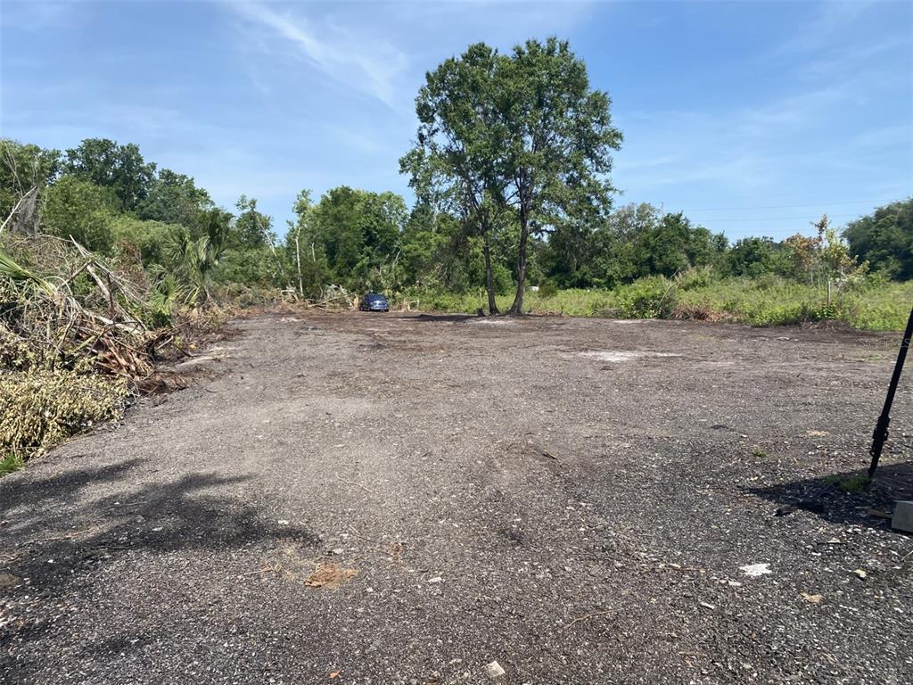 1604 Vintage Street Kissimmee, FL 34746 - Photo 22 of 23 a view of an outdoor space with trees all around