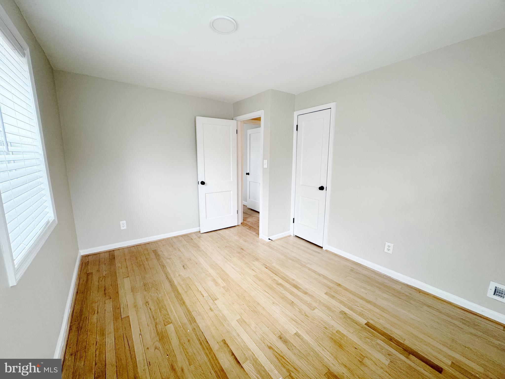 11969 Andrew Street Silver Spring, MD 20902 - Photo 13 of 20 a view of an empty room and window