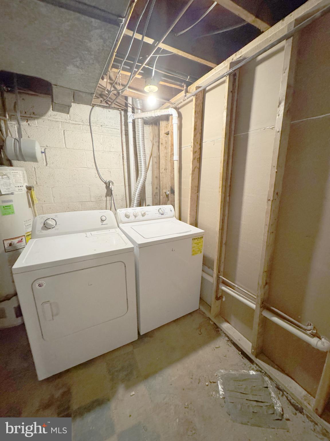 11969 Andrew Street Silver Spring, MD 20902 - Photo 16 of 20 a utility room with dryer and washer