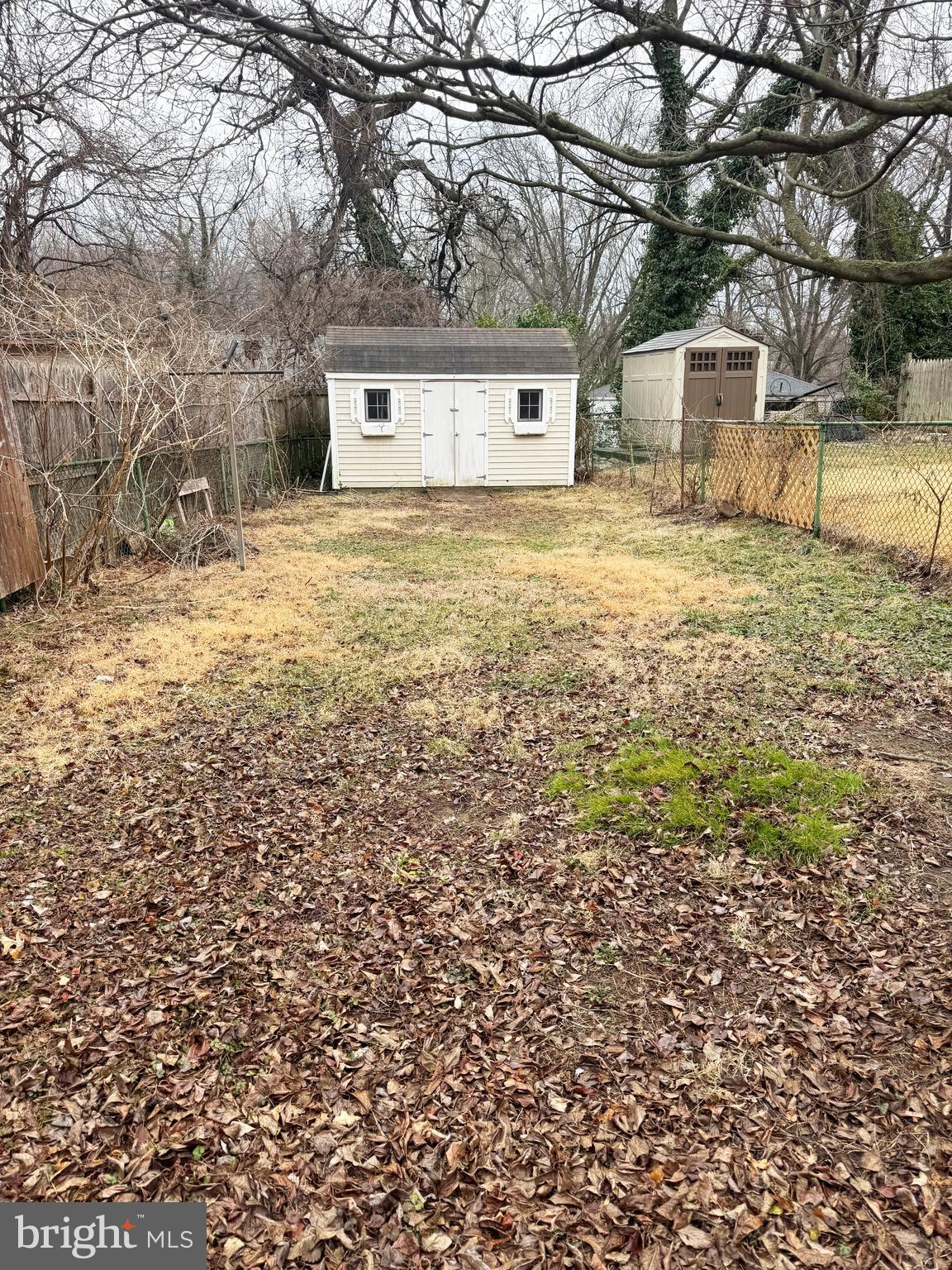 11969 Andrew Street Silver Spring, MD 20902 - Photo 19 of 20 a front view of a house with a yard