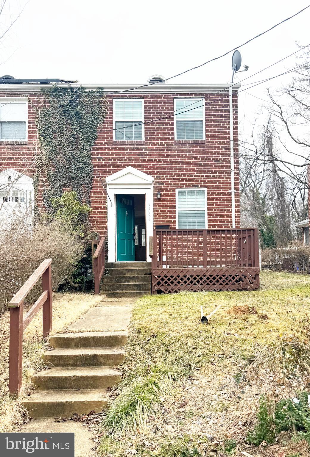 11969 Andrew Street Silver Spring, MD 20902 - Photo 2 of 20 a view of a house with a yard