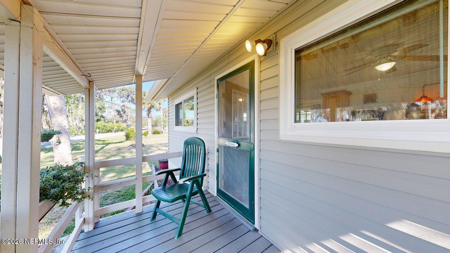 101 Possum Hollow Road Georgetown, FL 32139 - Photo 4 of 17 a view of a balcony with furniture
