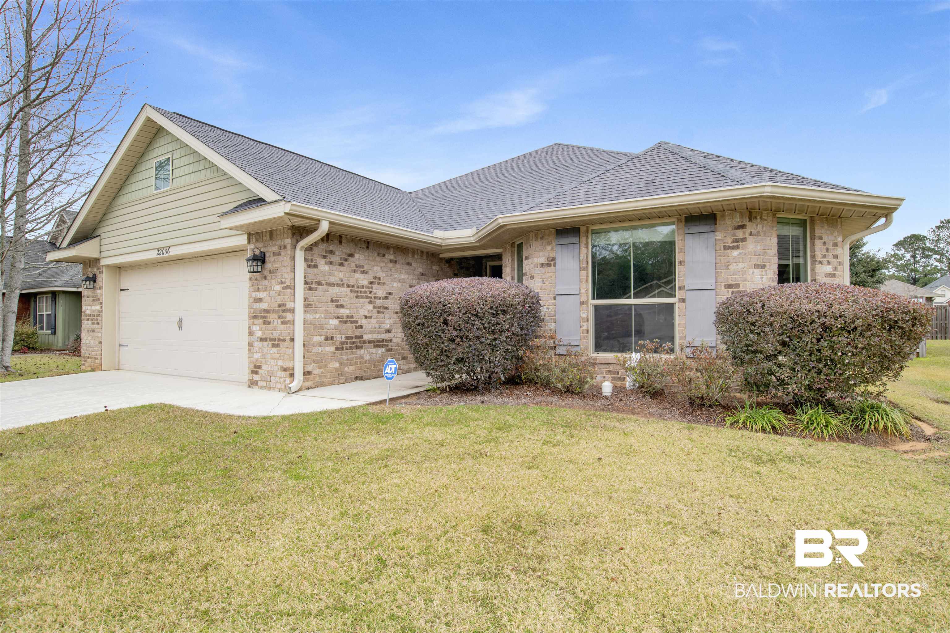 22056 Garland Loop Silverhill, AL 36576 - Photo 1 of 28 Ranch-style house with brick siding, a front yard, and roof with shingles