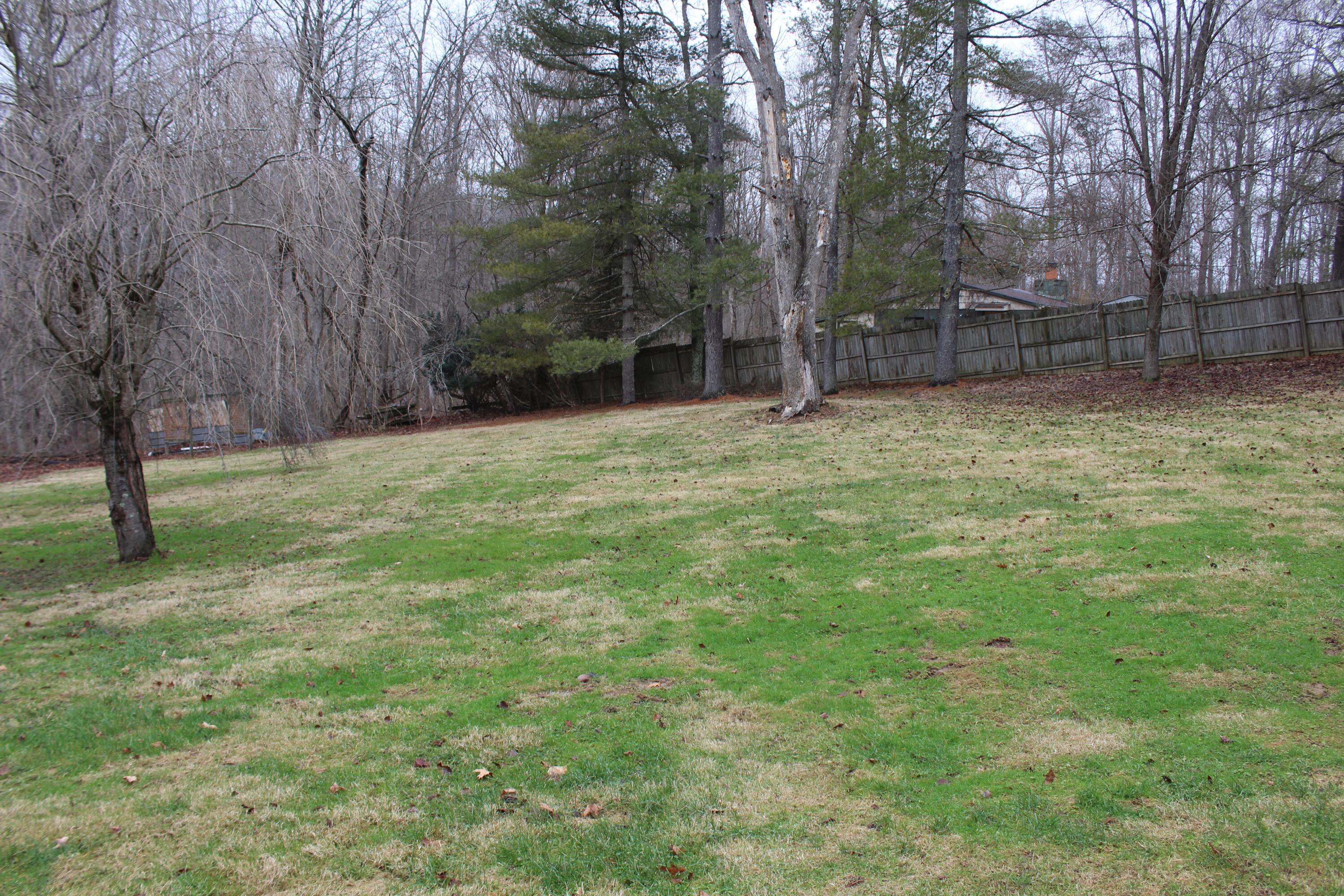 28760 Murphy Road Logan, OH 43138 - Photo 34 of 44 1 acre of gently sloping ground w/ privacy fence around much of it