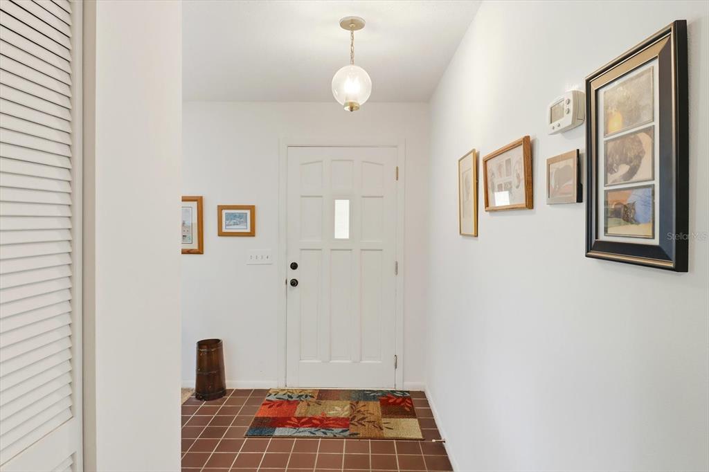 3103 South Bay Berry Point Inverness, FL 34450 - Photo 12 of 50 a bedroom with a bed and a table