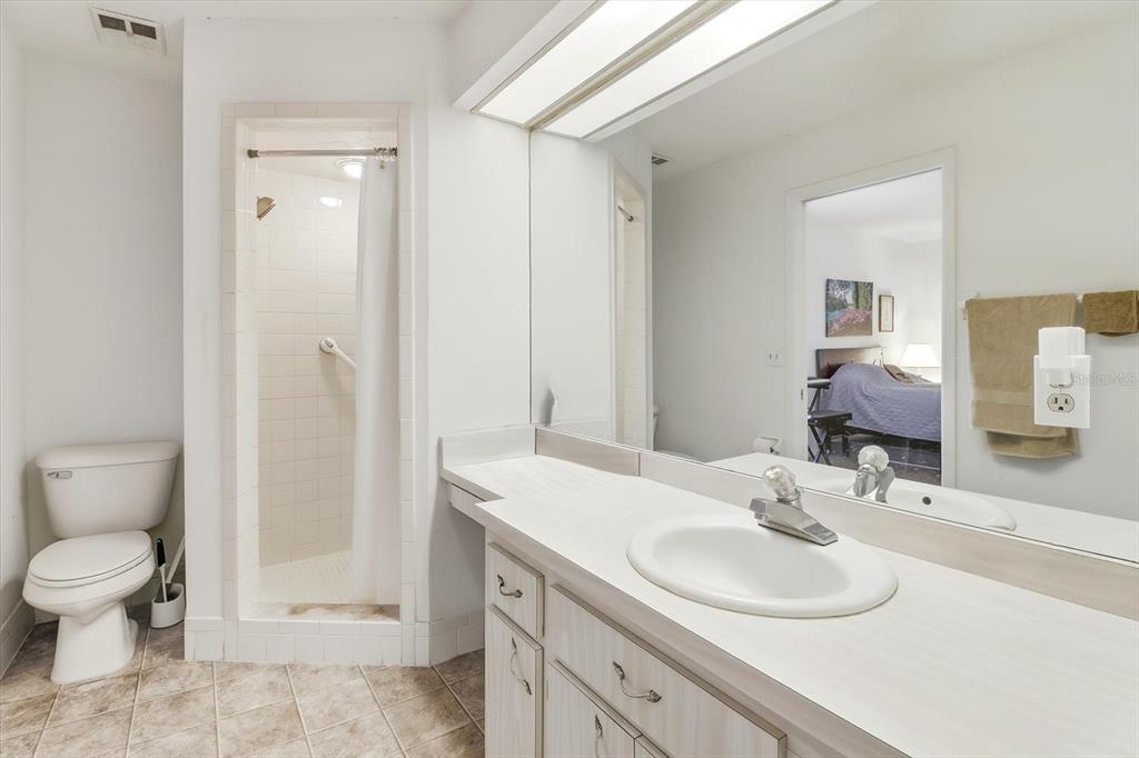 3103 South Bay Berry Point Inverness, FL 34450 - Photo 27 of 50 a bathroom with a sink toilet and shower