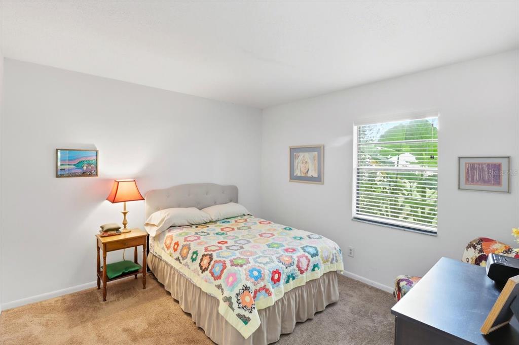 3103 South Bay Berry Point Inverness, FL 34450 - Photo 29 of 50 a bedroom with a bed and a window