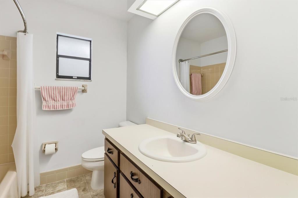 3103 South Bay Berry Point Inverness, FL 34450 - Photo 32 of 50 a bathroom with a sink and a mirror