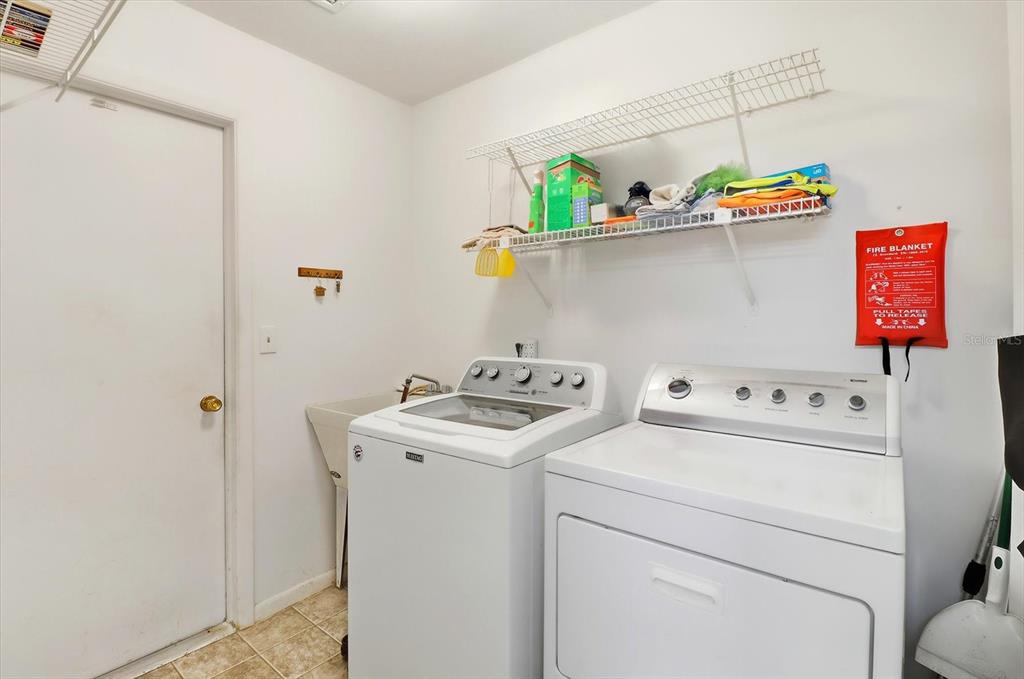 3103 South Bay Berry Point Inverness, FL 34450 - Photo 36 of 50 a utility room with dryer and washer