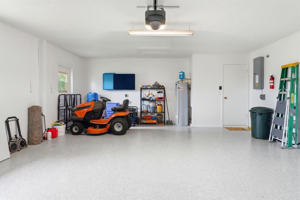 3103 South Bay Berry Point Inverness, FL 34450 - Photo 37 of 50 a view of a livingroom with furniture and a tv